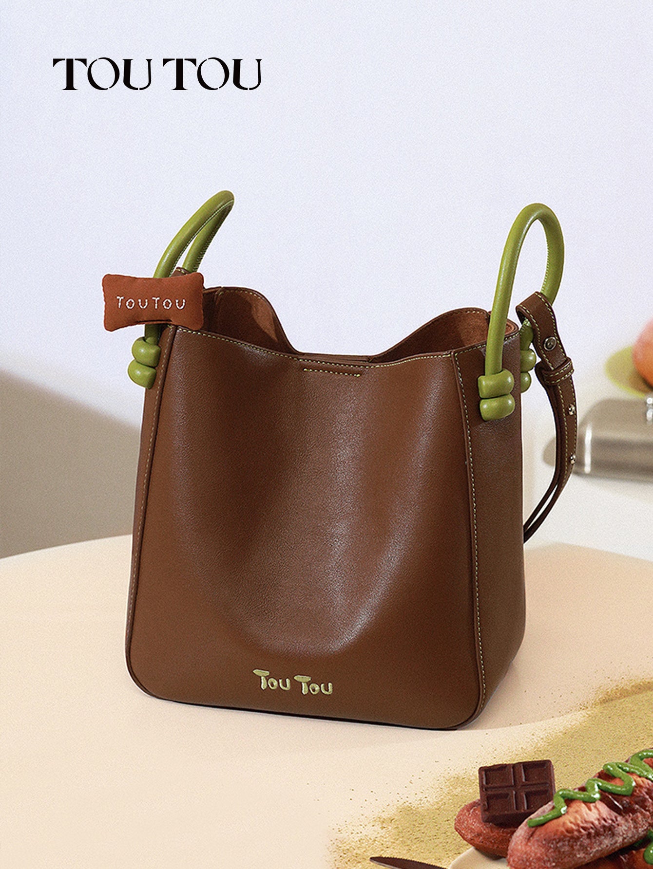 TOUTOU Brown Bucket Bag: Contrast - Color Handles & Versatile Carry