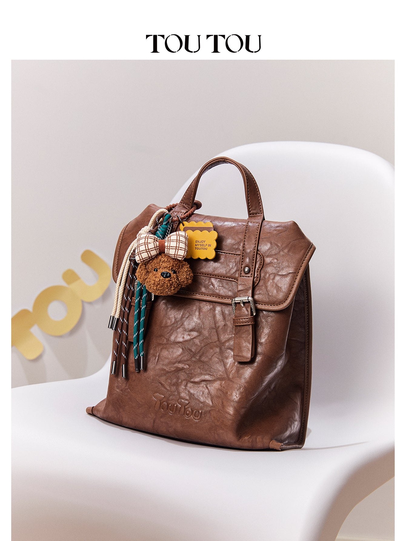TOUTOU Vintage Microfiber Leather Backpack with Plush Pendant – Fits 8.3'' Device, Adjustable Strap