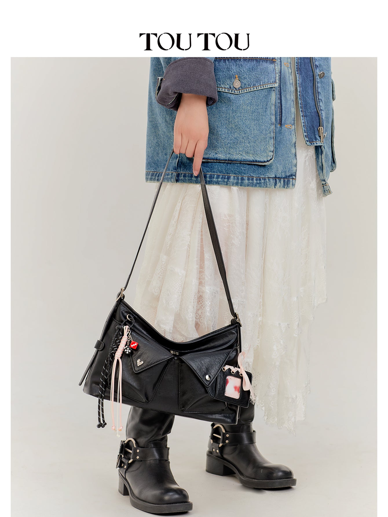 TOUTOU Black Crossbody Bag: Edgy Design with Adjustable Strap
