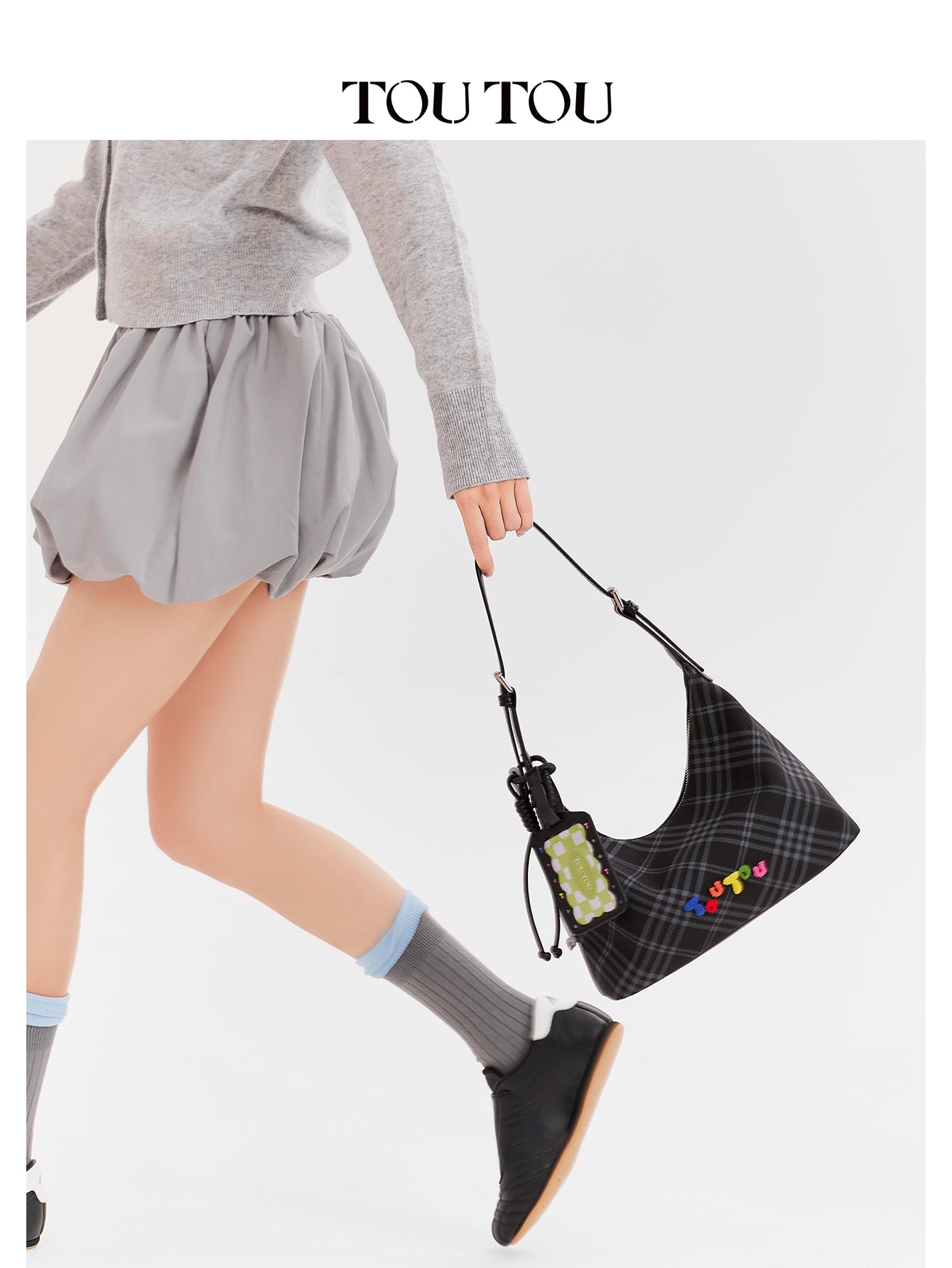 TOUTOU Black Plaid Hobo Bag with Colorful Branding: Trendy & Playful