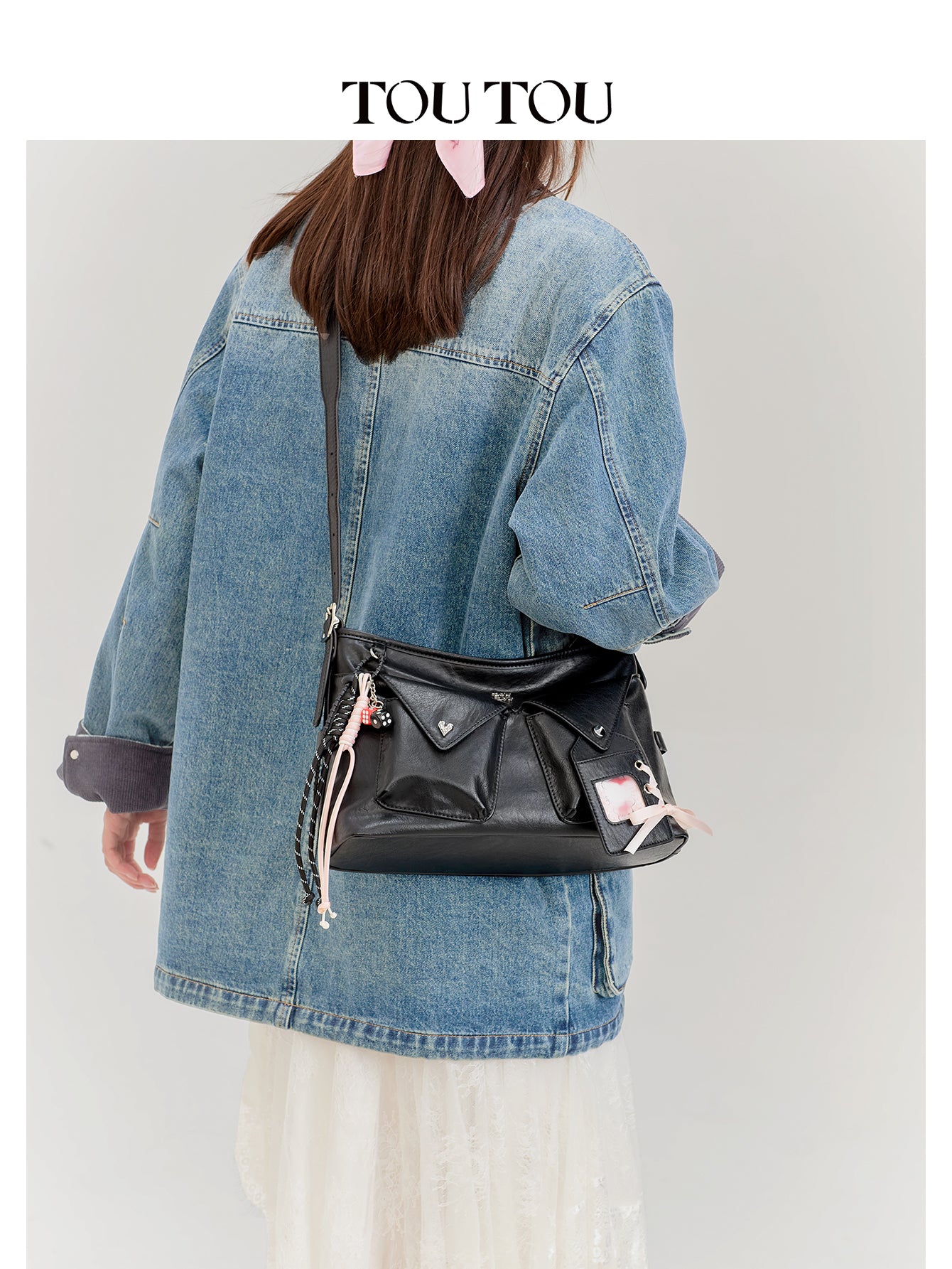 TOUTOU Black Crossbody Bag: Edgy Design with Adjustable Strap