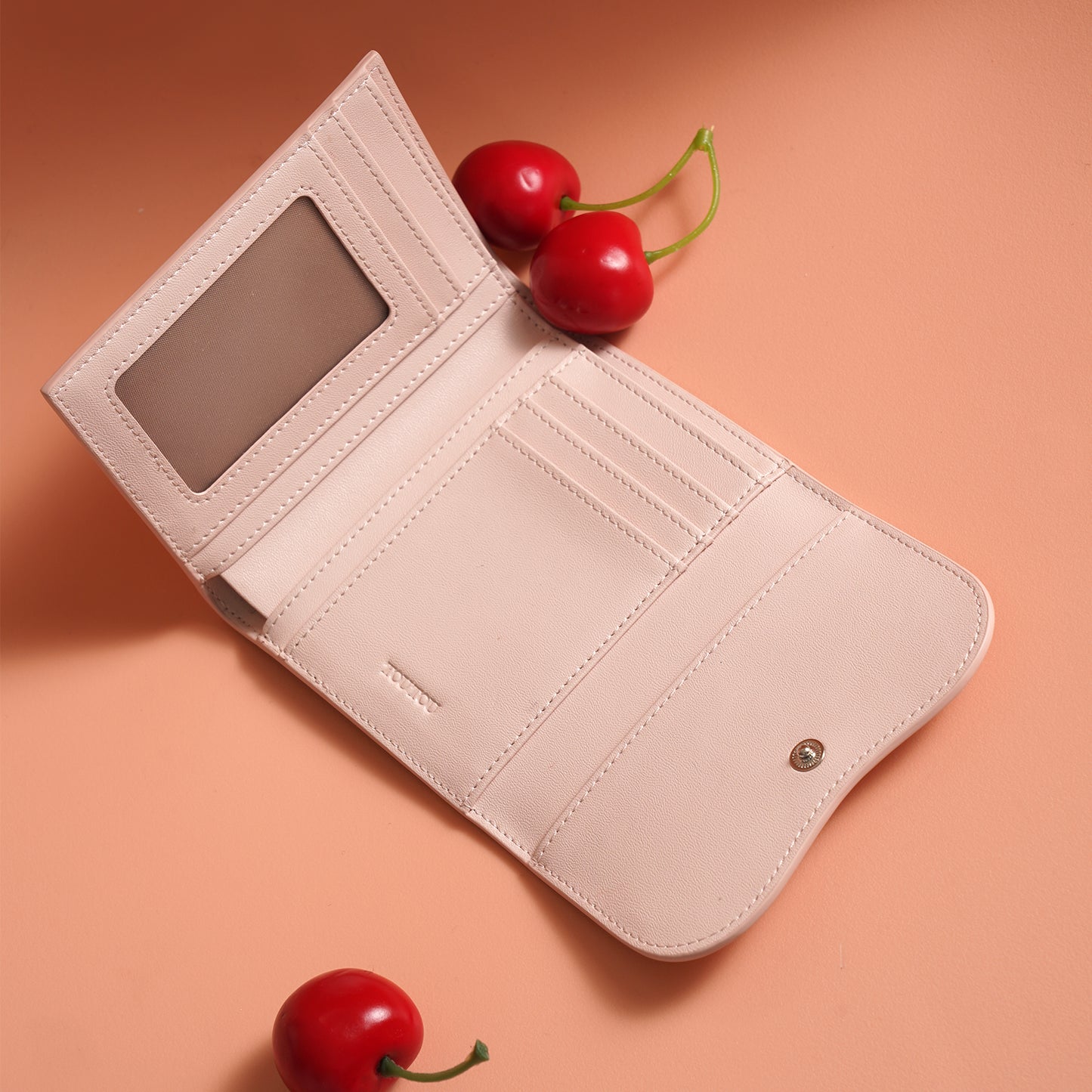 TOUTOU Cherry - Embossed Pink Wallet: A Sweet & Chic Accessory