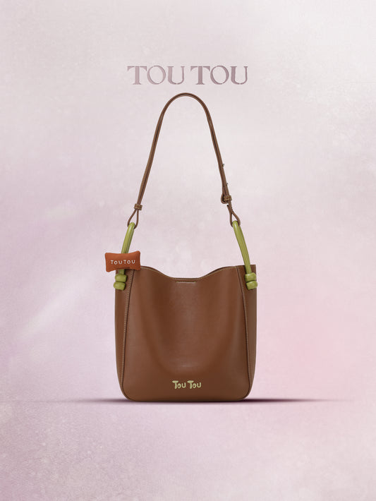 TOUTOU Brown Bucket Bag: Contrast - Color Handles & Versatile Carry