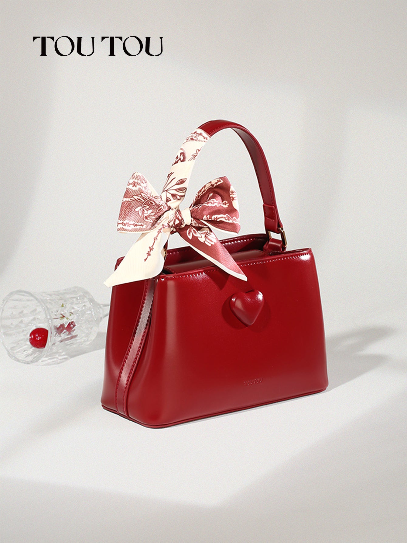 TOUTOU Red Heart - Accent Handbag: Elegant Design with Scarf Detail