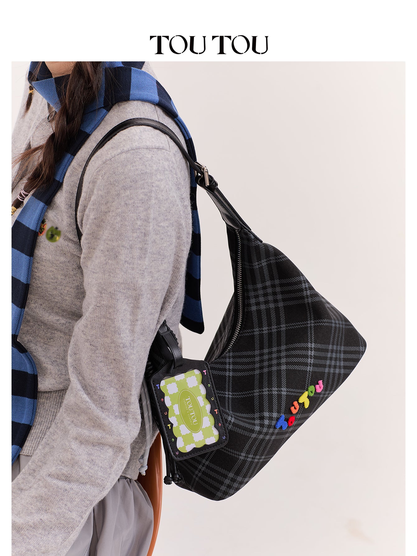 TOUTOU Black Plaid Hobo Bag with Colorful Branding: Trendy & Playful