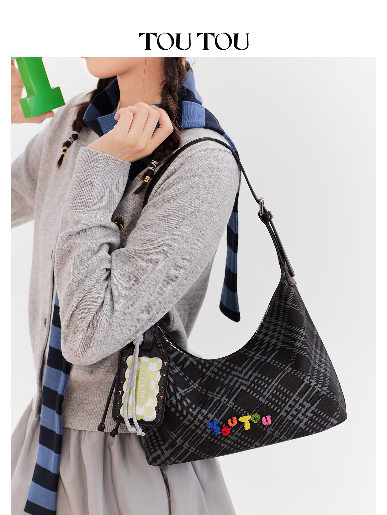 TOUTOU Black Plaid Hobo Bag with Colorful Branding: Trendy & Playful