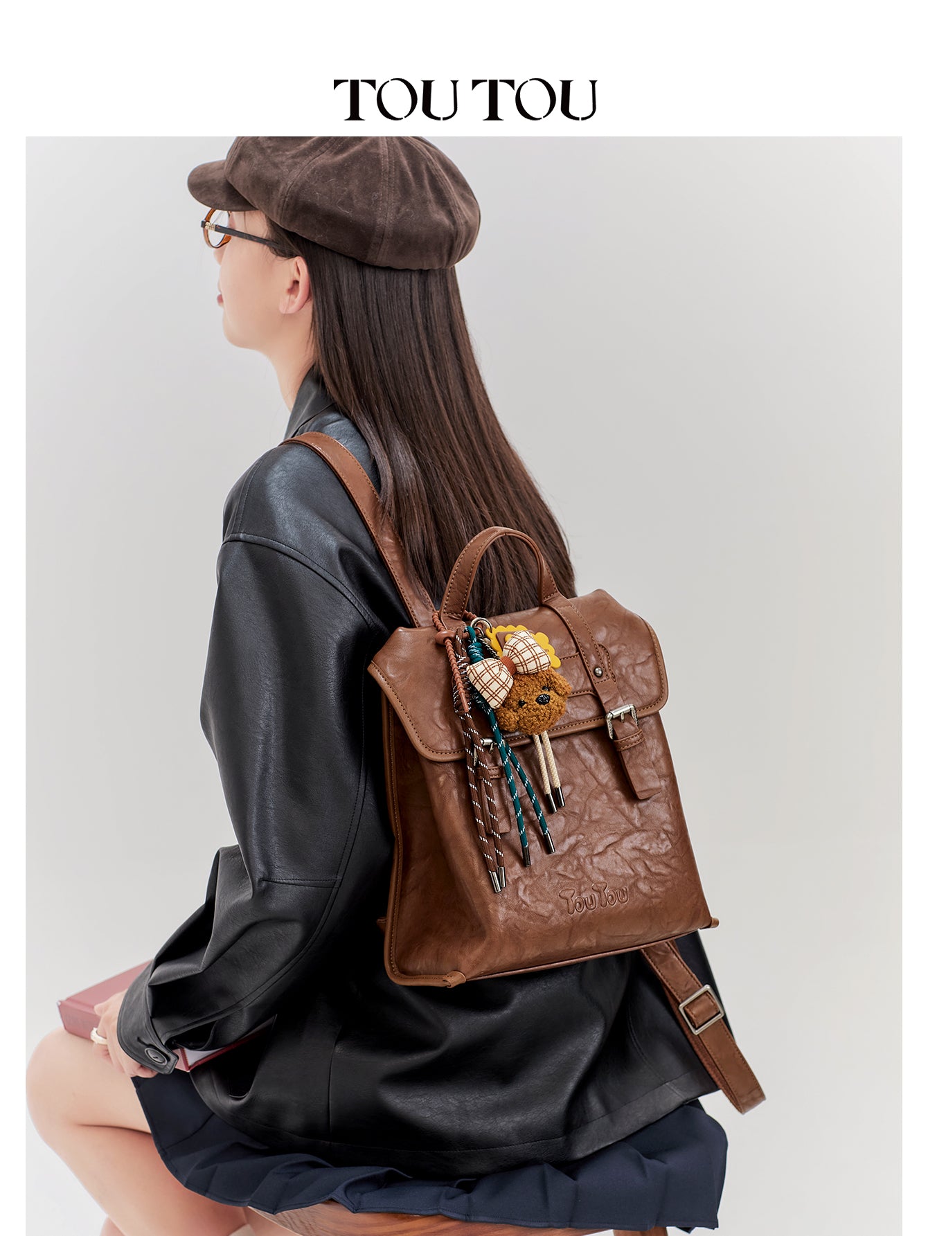 TOUTOU Vintage Microfiber Leather Backpack with Plush Pendant – Fits 8.3'' Device, Adjustable Strap