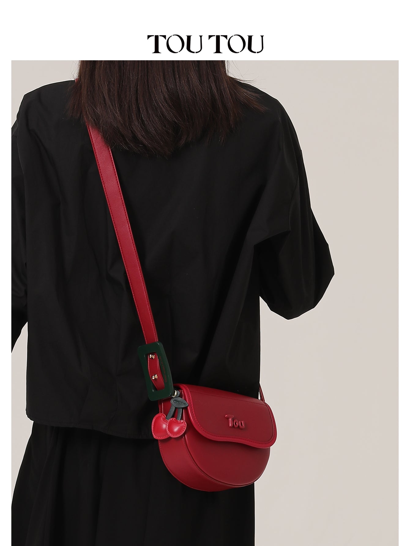 TOUTOU Red Saddle Bag: Cherry Accents & Adjustable Strap